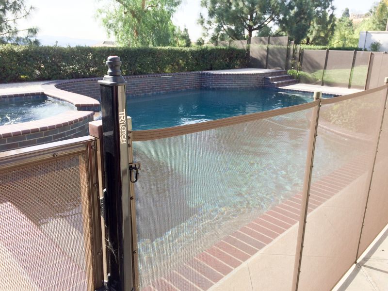 Pool with Mesh Safety Fence